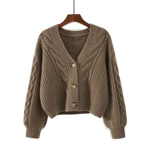 Ladies cozy knitted pullover with cable pattern and button closure Lune London