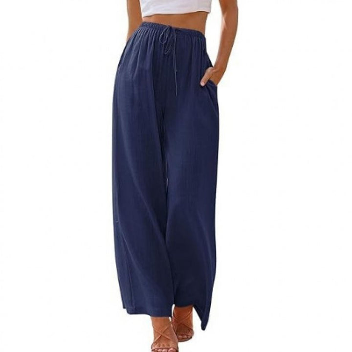 Wide palazzo pants for women with elastic waistband and side pockets Lune London