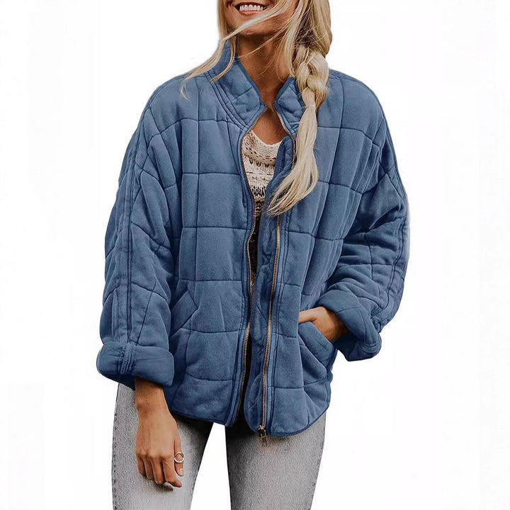 Ladies quilted jacket with high collar and practical pockets Lune London