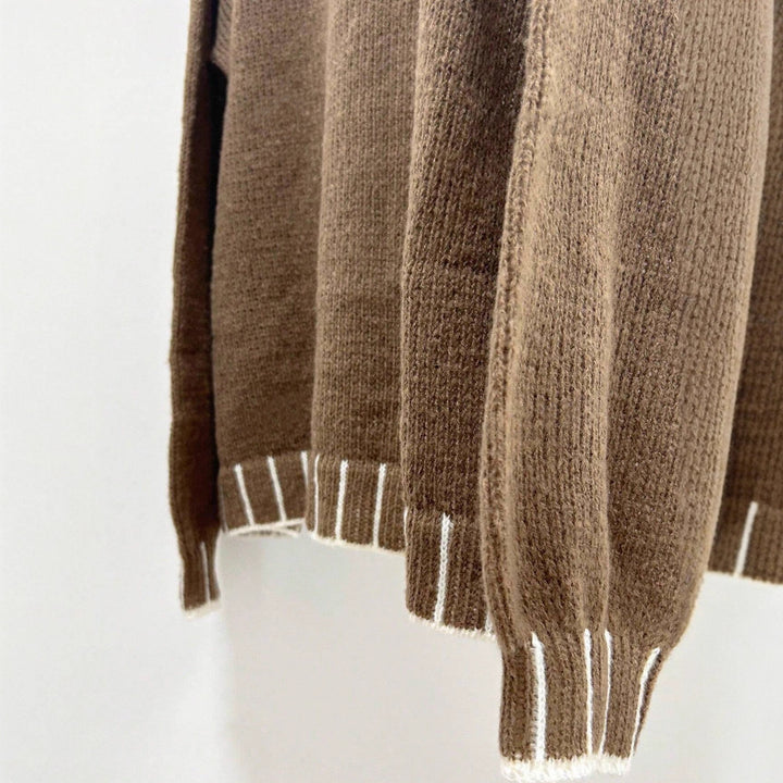 Pull en tricot décontracté pour femmes avec col montant et manches ajustables Chic & Stil