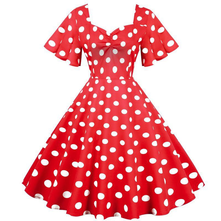 Robe Rockabilly pour femmes avec un motif amusant à pois et un ourlet flottant Chic & Stil