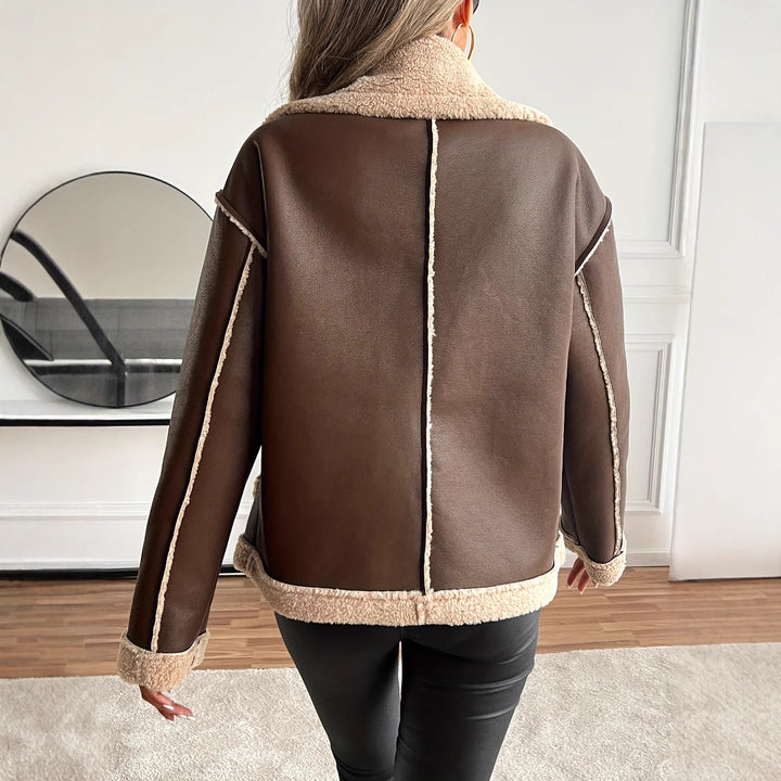 Short women's jacket with faux fur trim and practical pockets Lune London