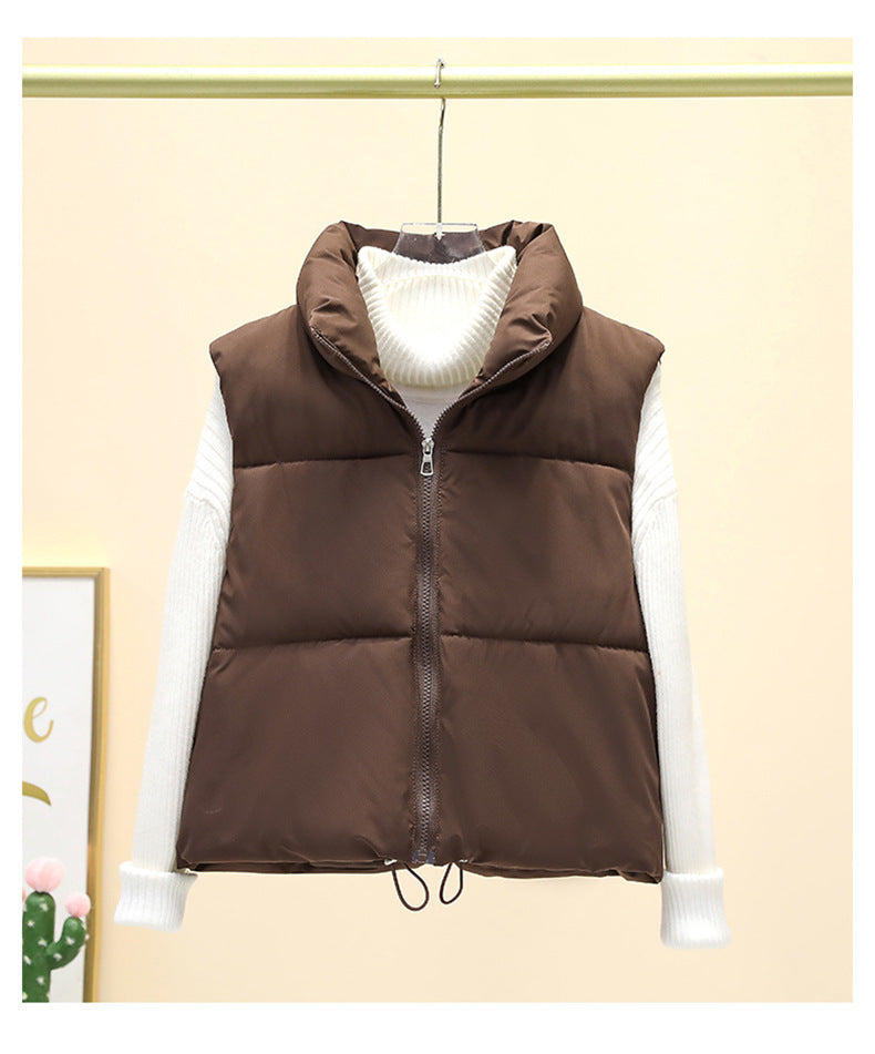Ladies quilted gilet with high collar and adjustable waist Lune London
