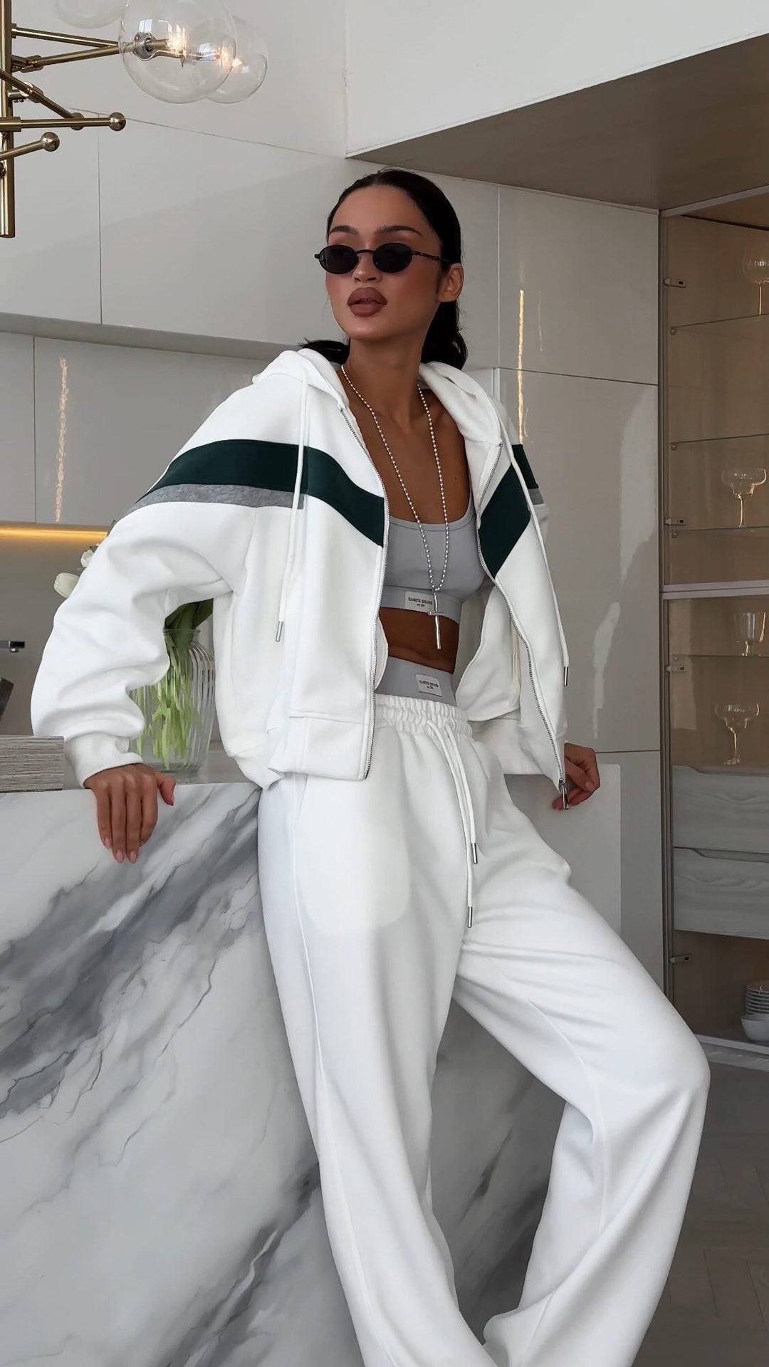 Sporty women's tracksuit with a modern cut and trendy accents Lune London