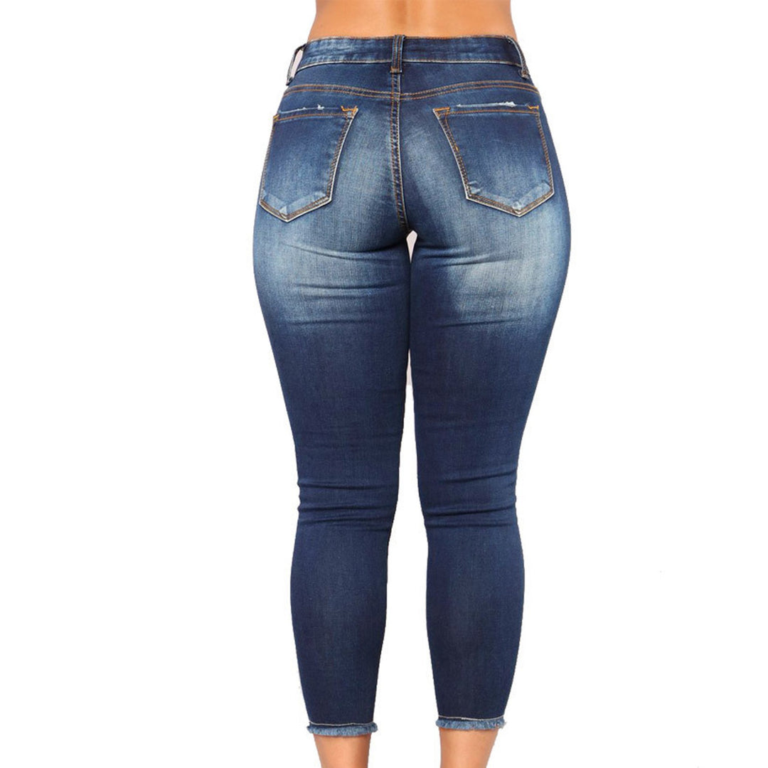 Women’s fitted jeans with a casual destroyed look and high waist Lune London