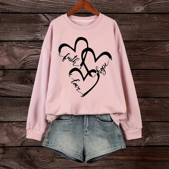Sweatshirt pour femmes avec motif de cœur romantique et impression inspirante Chic & Stil