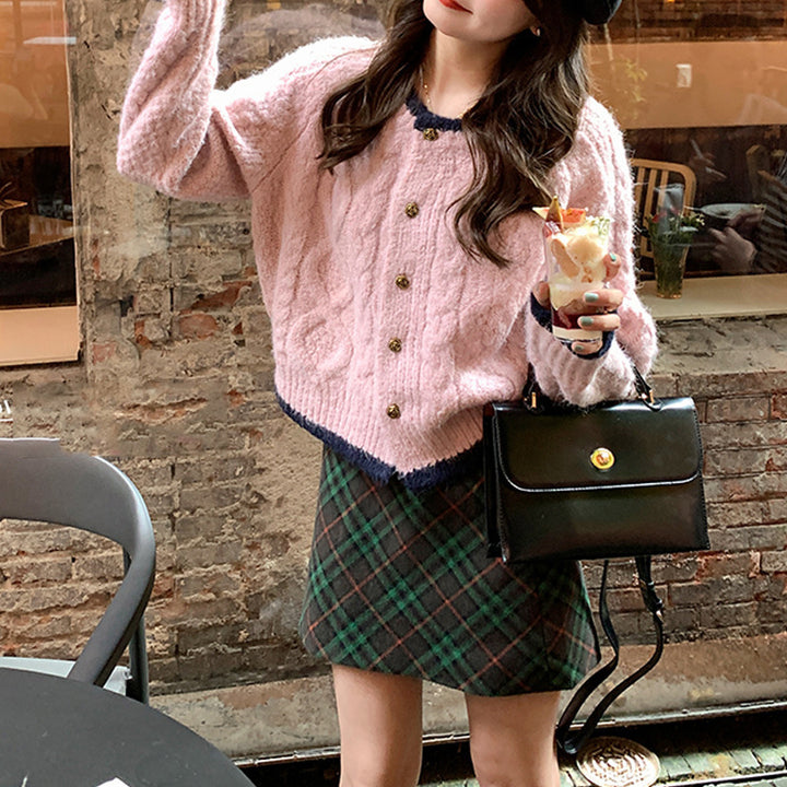 Ladies large knit cardigan with a unique weaving pattern and elegant buttons Lune London