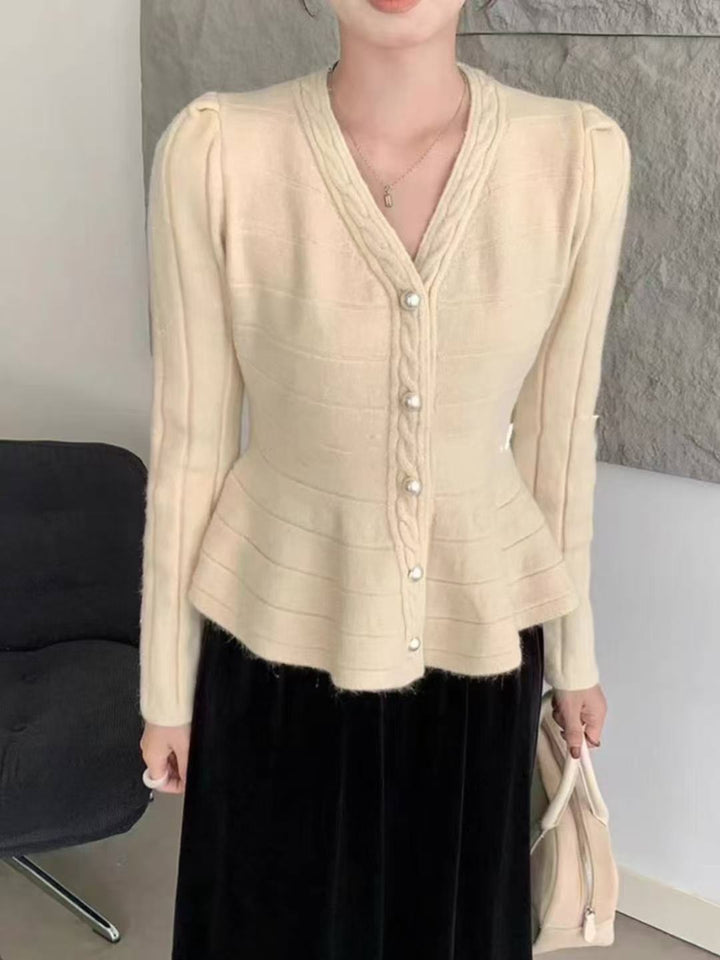 Ladies elegant cardigan with textured design and feminine puff sleeves Lune London