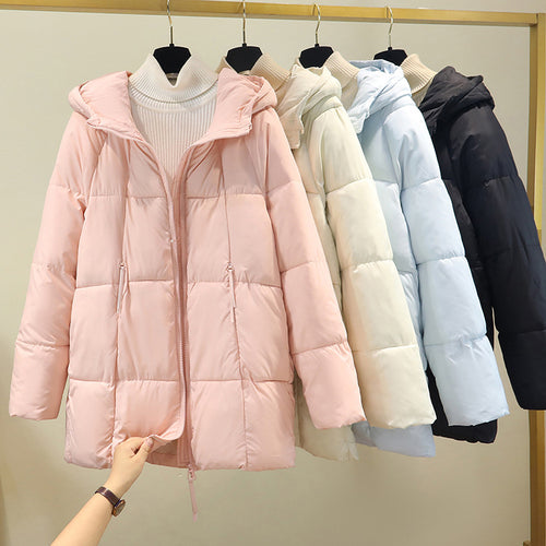 Ladies comfortable and stylish padded jacket with hood and practical zip pockets Lune London