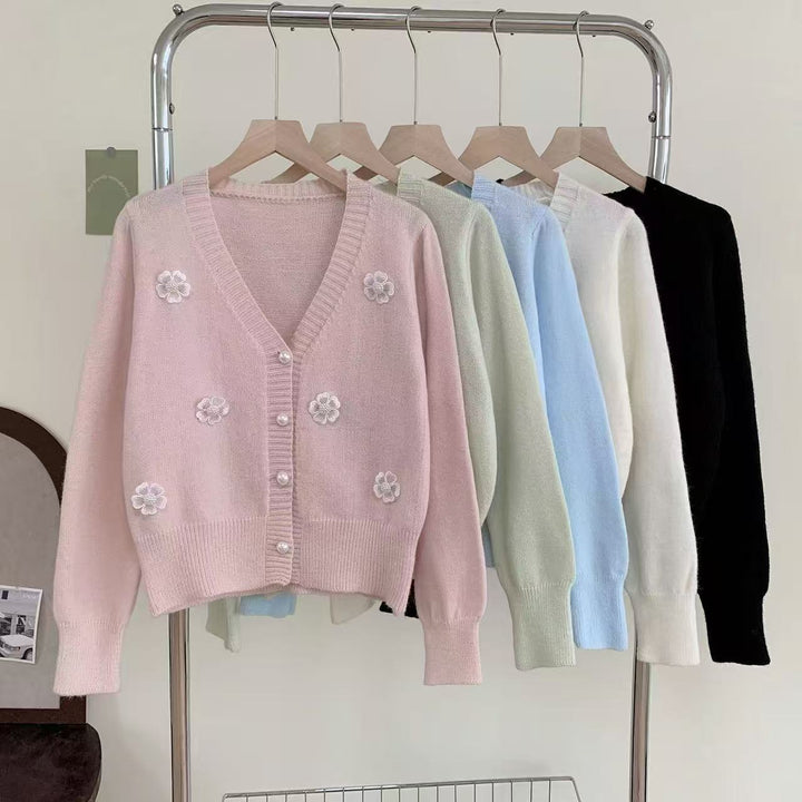 Ladies cozy knit vest with flower embroidery and pearl buttons Lune London