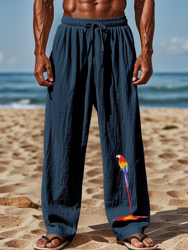 Light beach pants for men with colorful parrot design Lune London