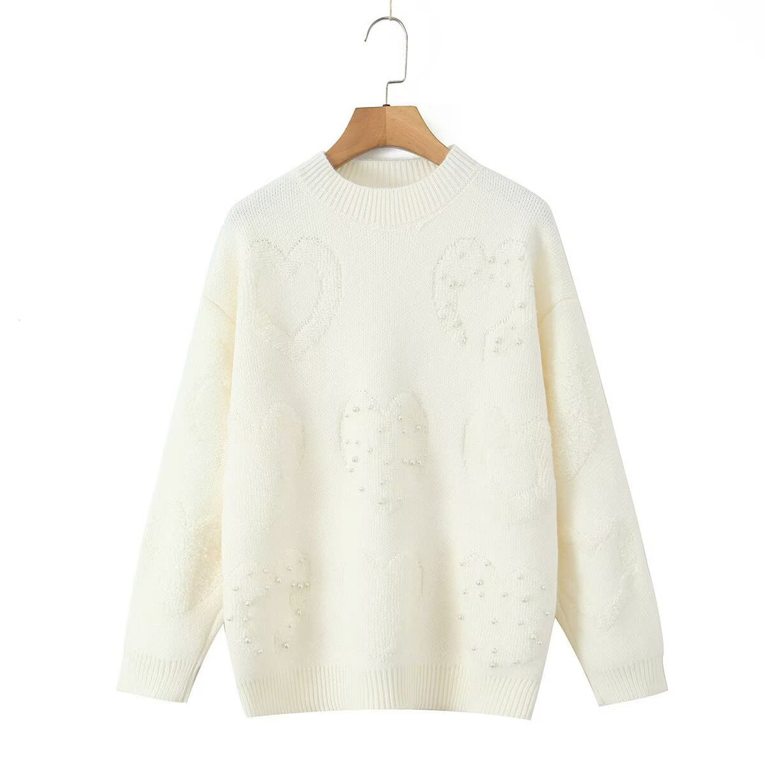 Pull en tricot confortable pour femmes avec motifs en cœur Chic & Stil