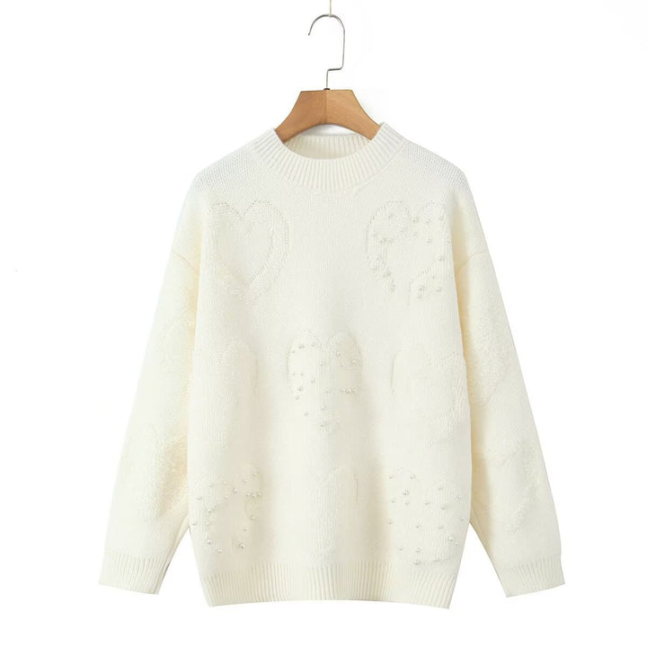Pull en tricot confortable pour femmes avec motifs en cœur Chic & Stil