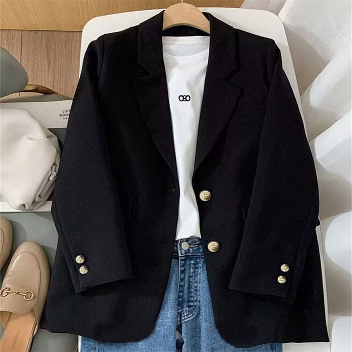 Blazer féminin chic avec tissu texturé et détails de bouton élégants Chic & Stil
