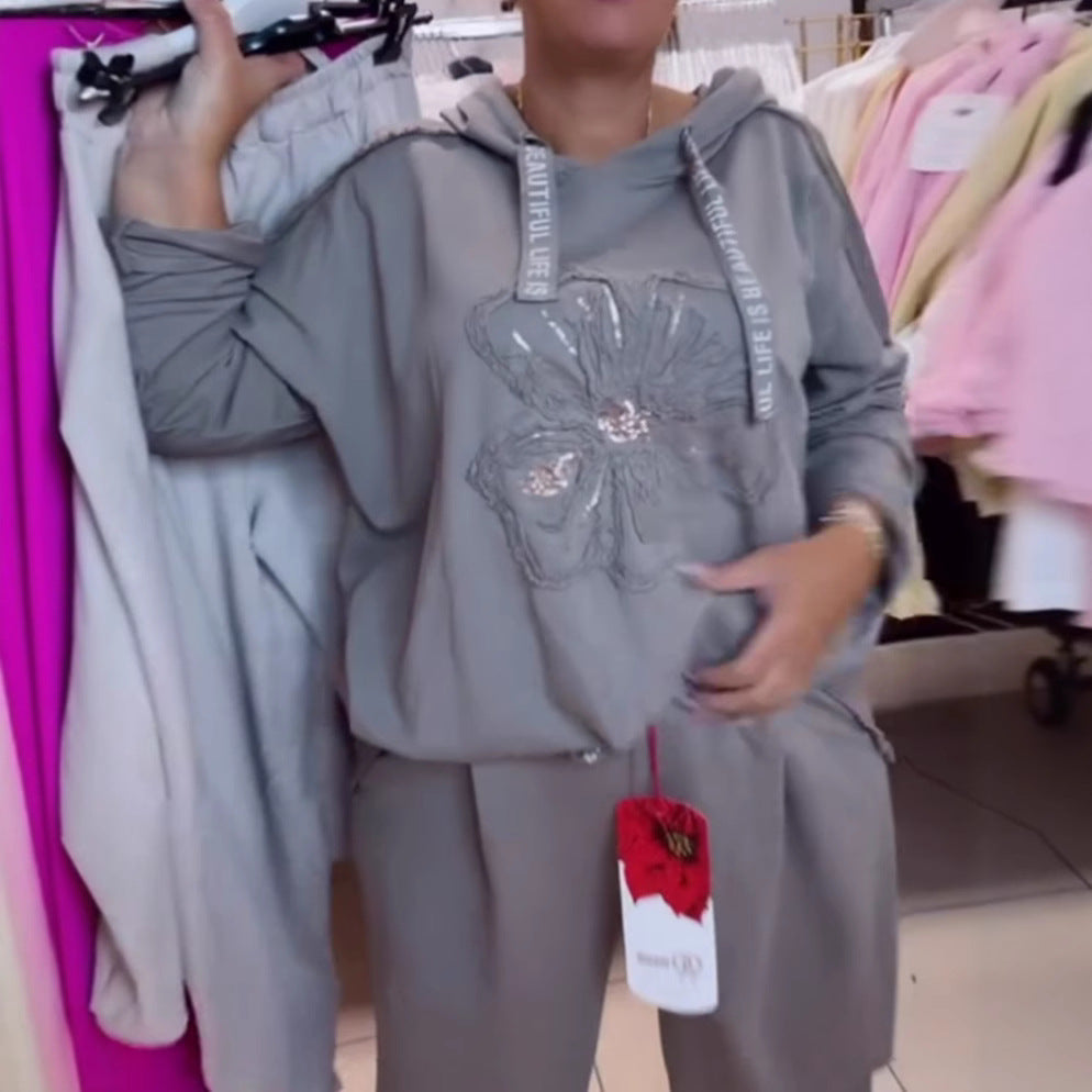 Haut de survêtement décontracté pour femmes avec un motif floral délicat et une broderie de haute qualité Chic & Stil