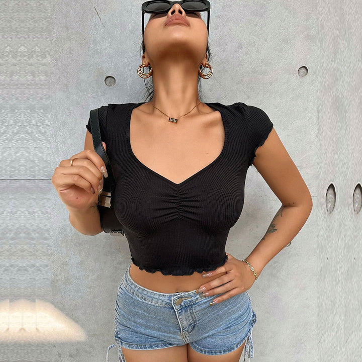 Short top for women with elastic gathers and trendy V-neck Chic & Stil