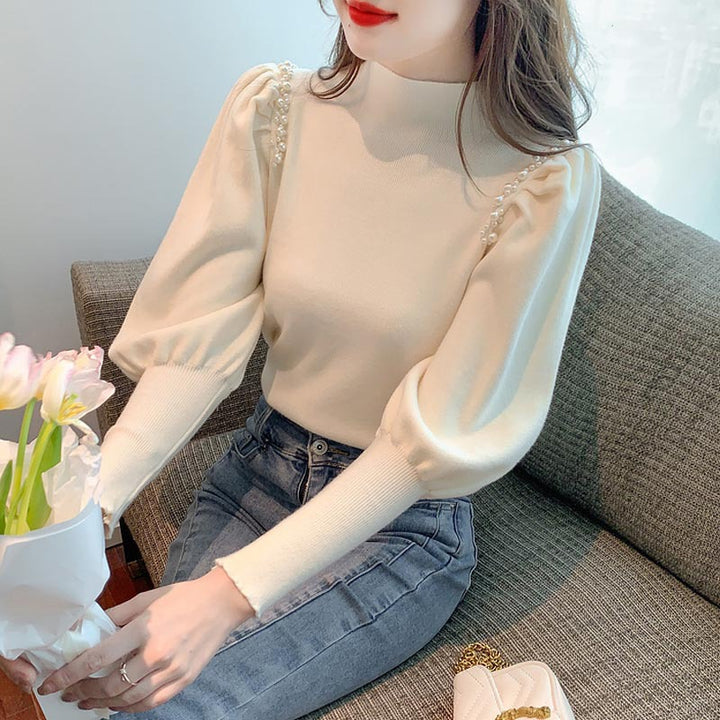 Elegant sweater for women with puff sleeves and pearl details Lune London