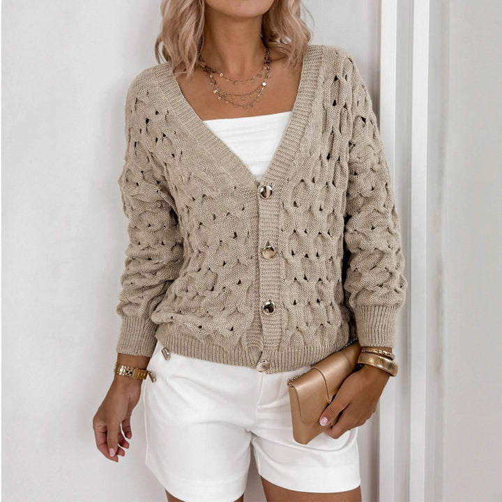 Women's knitted jacket with an airy knit structure and elegant button details Lune London