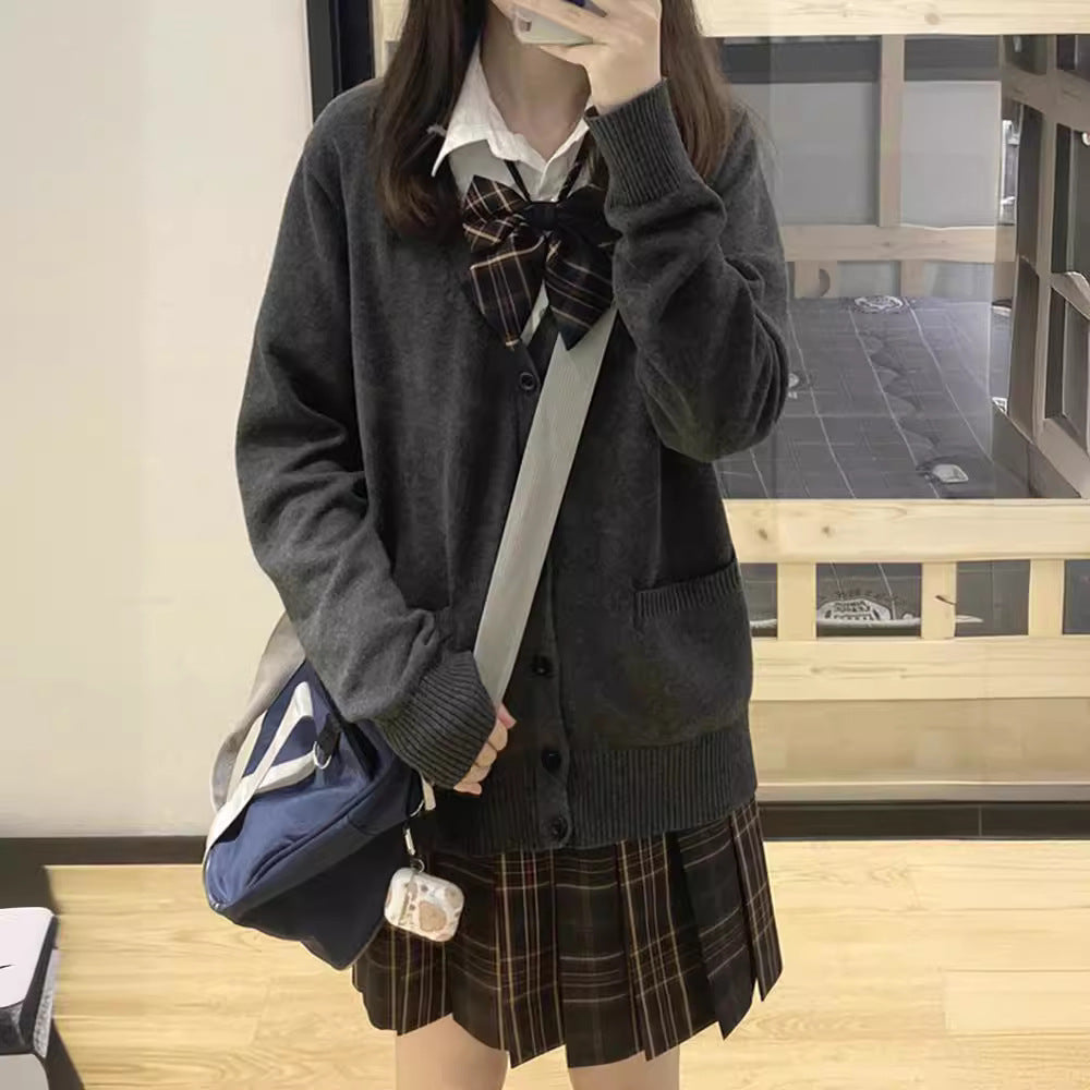 Cardigan féminin ludique avec grand col et détail de nœud Chic & Stil