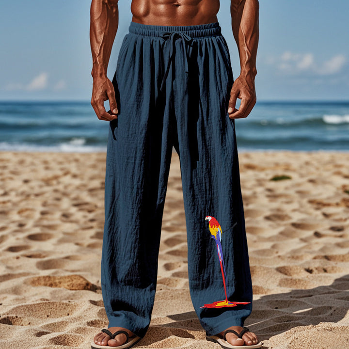 Casual beach pants for men with elastic waistband and colorful bird pattern Lune London