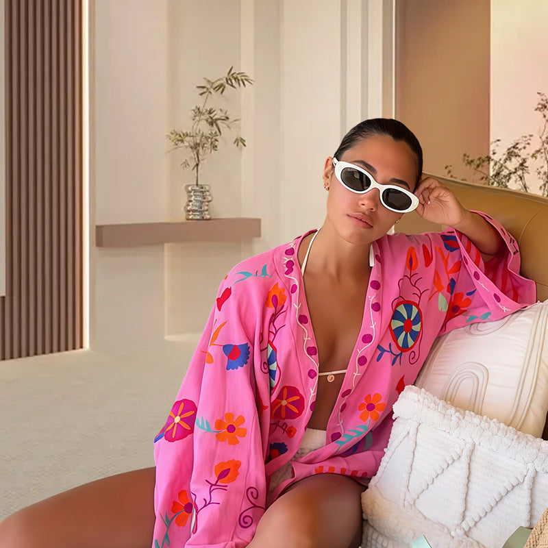 Ladies beach kimono with colorful floral pattern and relaxed fit Lune London