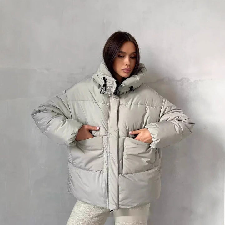 Sporty winter jacket for women with high collar and practical pockets Lune London