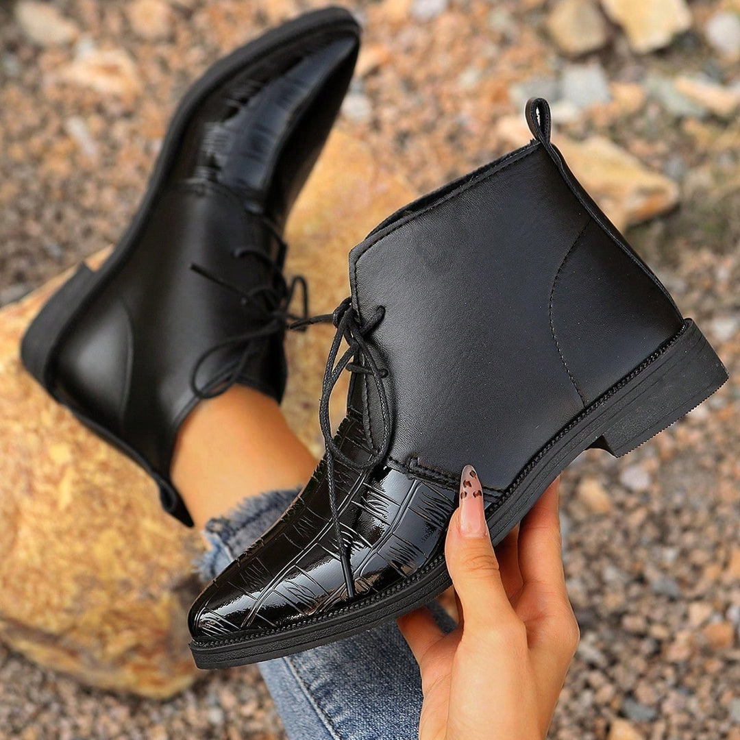 Fashion leather ankle boots for women with shiny accents and laces Lune London