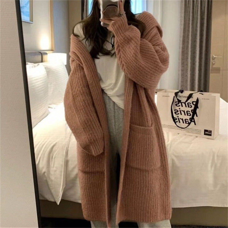 Long coat for women with an elegant ribbed structure and practical pockets Lune London