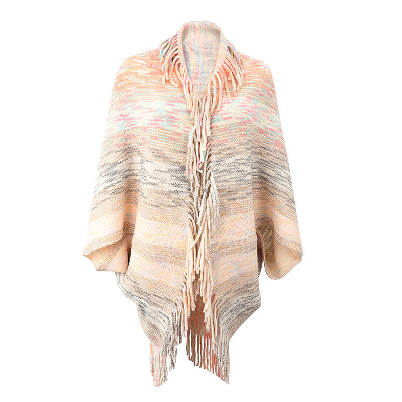 Trendy women's poncho with fringed hem and structured design Lune London
