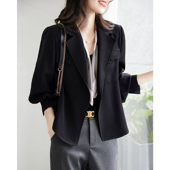 Blazer élégant pour dames avec des manches bouffantes structurées Chic & Stil