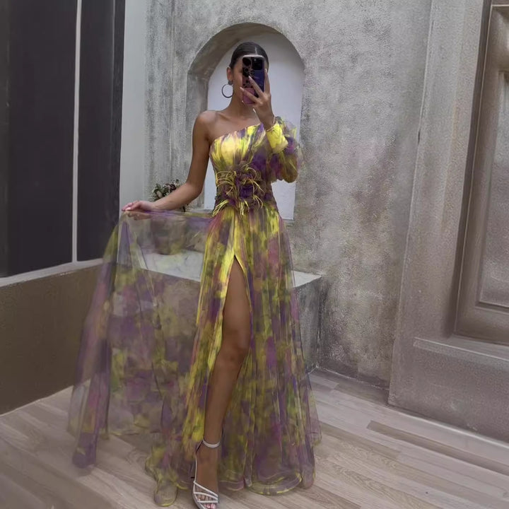 Women's evening dress with asymmetric design and floral accents Lune London