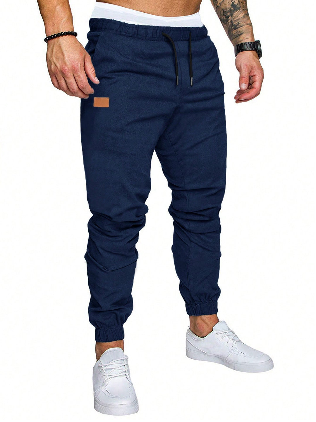 Casual men's jogging pants with elastic waistband and practical zipped pockets Lune London
