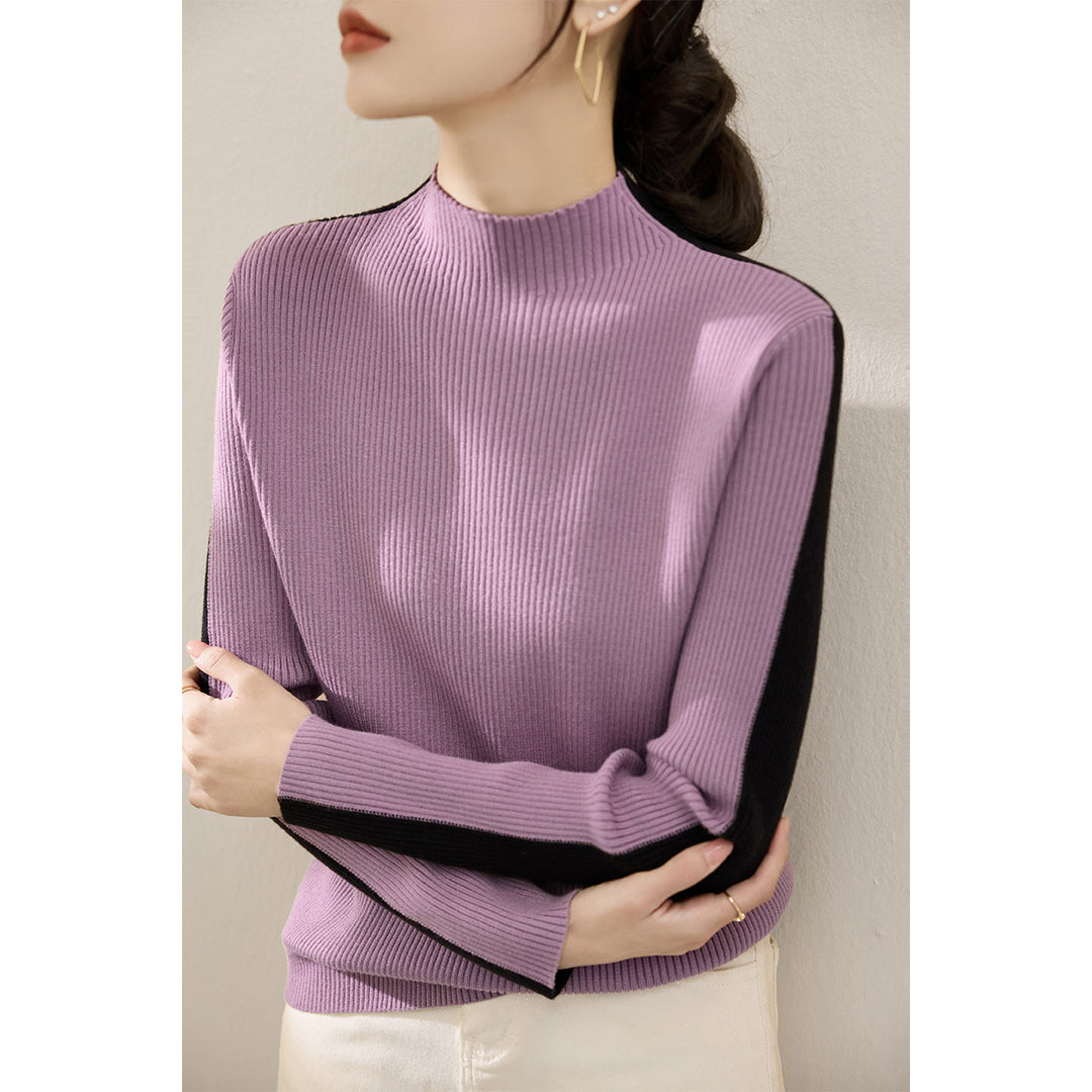 Pull à col roulé tendance pour femmes avec design en côtes texturées et manches contrastantes Chic & Stil