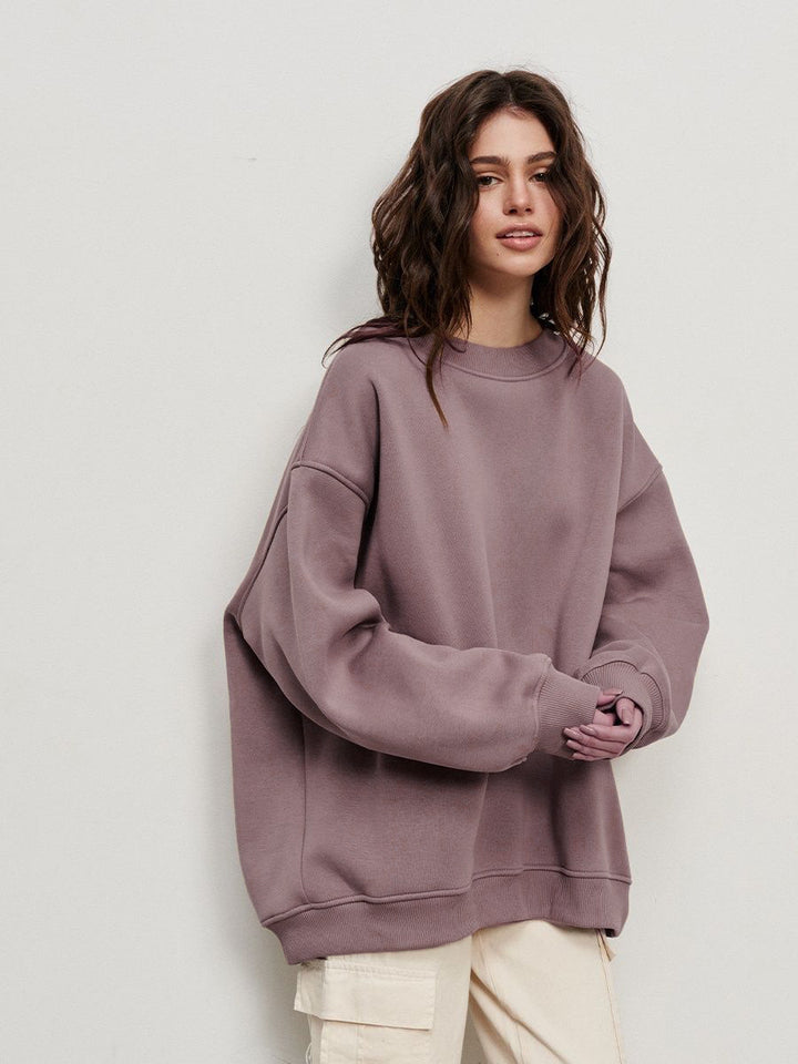 Woman Oversized sweatshirt with a relaxed fit and modern chic accents and style