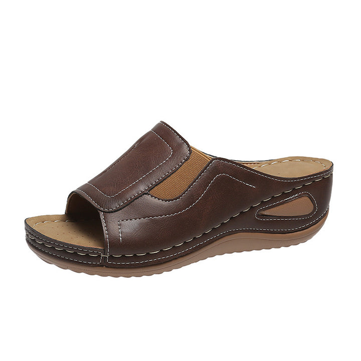 Comfortable women's clogs with elastic inserts and an anatomical sole Chic and Style