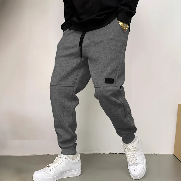 Sporty jogger pants for men with side zipper details Lune London