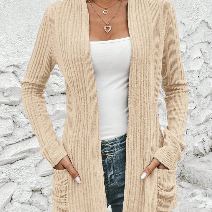 Long women's cardigan with a fine rib structure and practical pockets Lune London