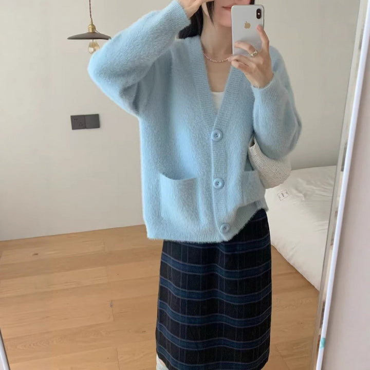 Cardigan pelucheux à boutons pour femmes avec poches élégantes Chic & Stil