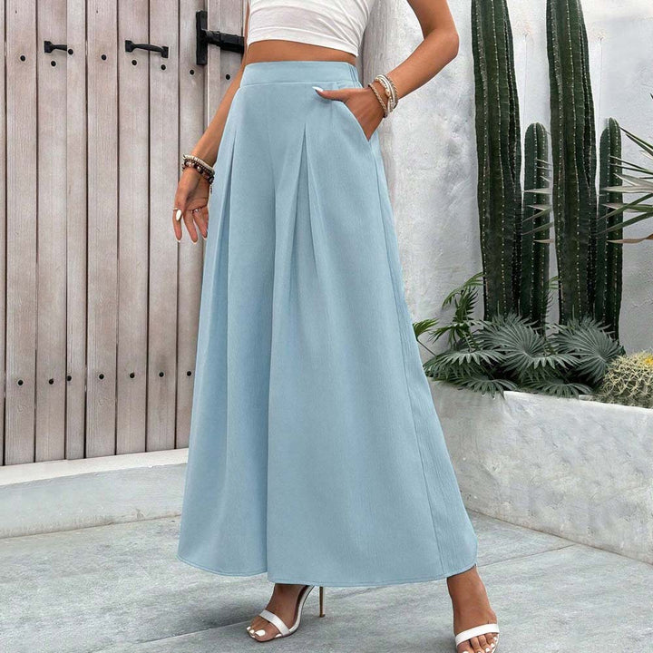 Pantalons larges Palazzo pour femmes avec des plis élégants et un design de poche pratique Chic & Stil
