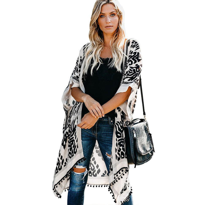 Ladies lightweight kimono cardigan with intricate pattern and fringed hem Lune London