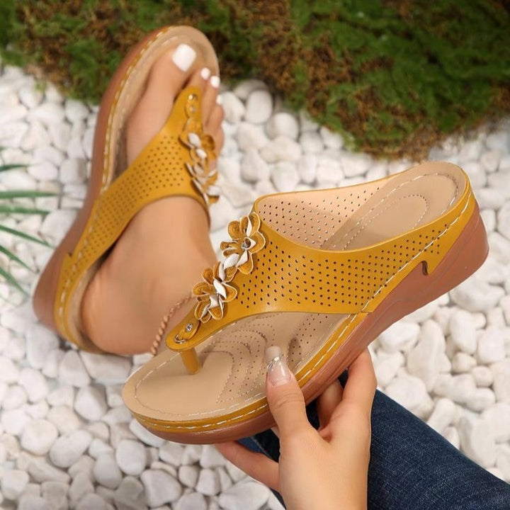 Fashionable floral sandals for women with a perforated upper Lune London