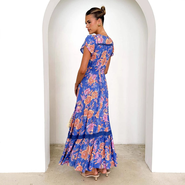 Maxi dress for women with floral pattern and deep V-neck Chic & Stil