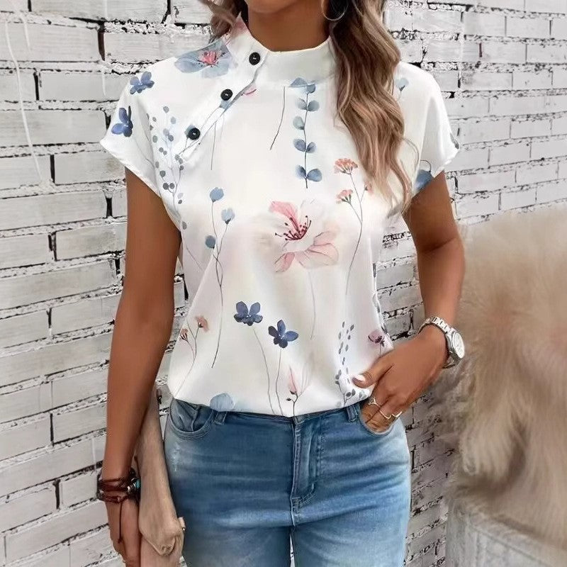 Women’s blouse with floral pattern and cape sleeves Lune London