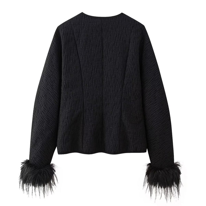 Elegant ladies' down jacket with elaborate ruffle details and high collar Lune London