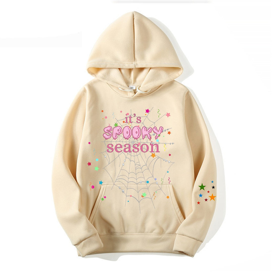 Women cozy hoodie with graphic Halloween design Chic & Stil