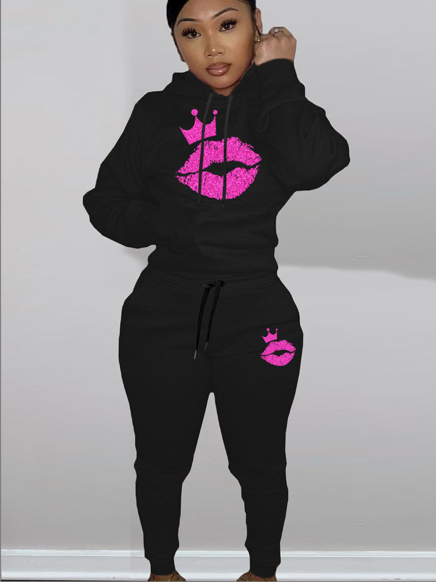 Women's hoodie and jogger set with a catchy lip pattern and a Lune London crown