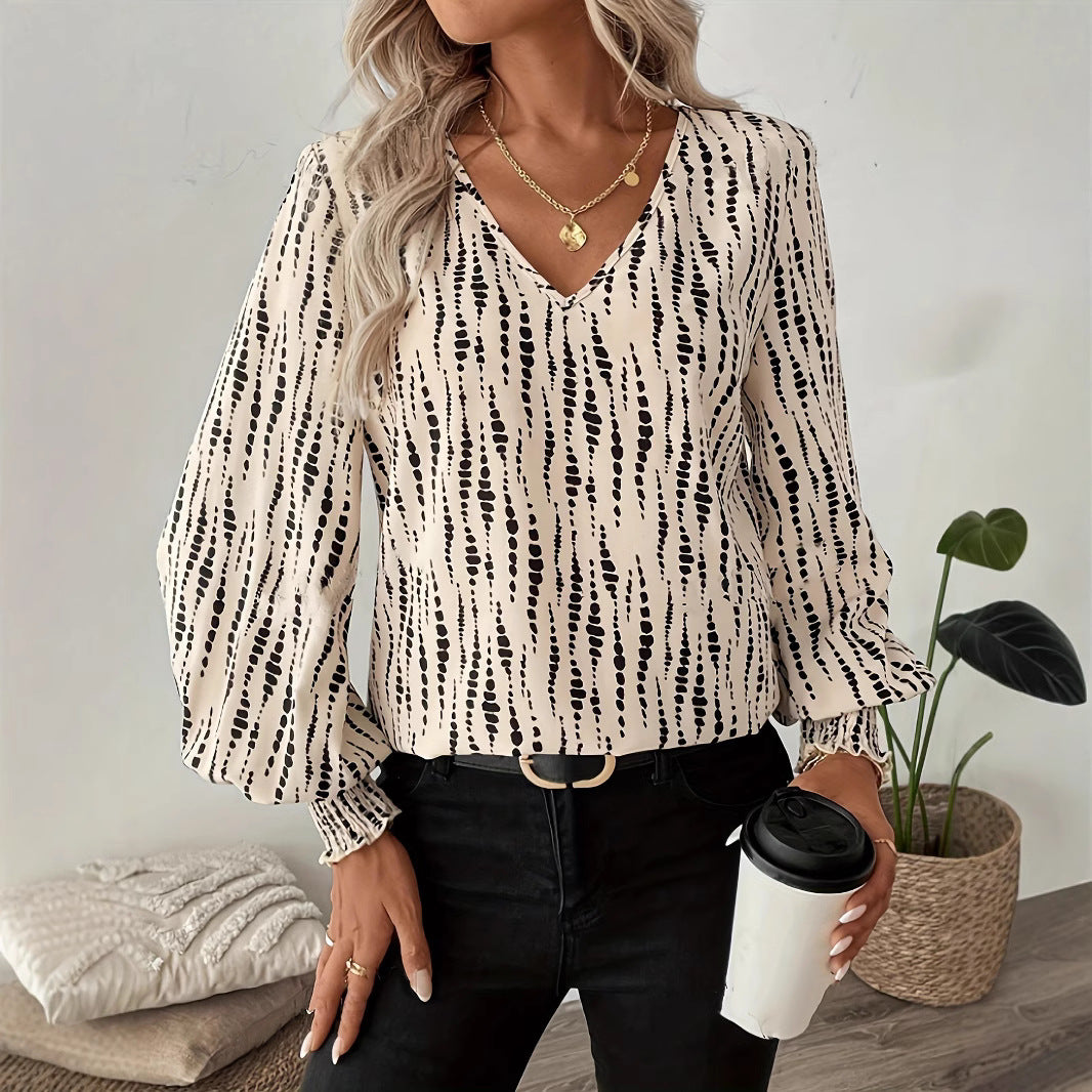 Women's blouse with V-neck and puff sleeves Lune London