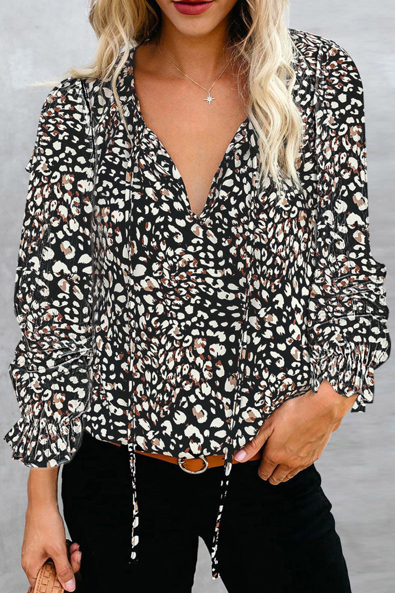 Women's shirt with V-neck and ruffle details Lune London