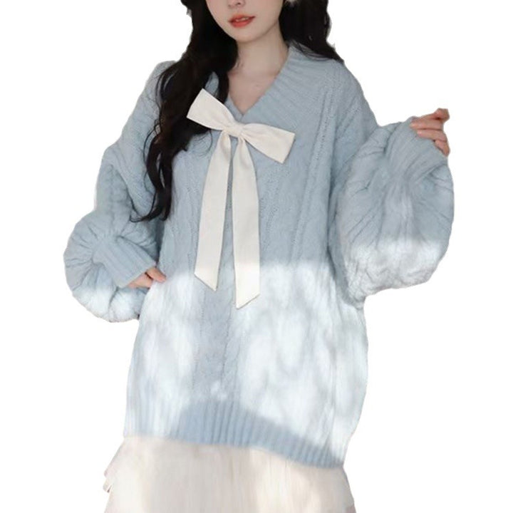 Ladies Large knitted sweater with bow detail and cable knit pattern Lune London
