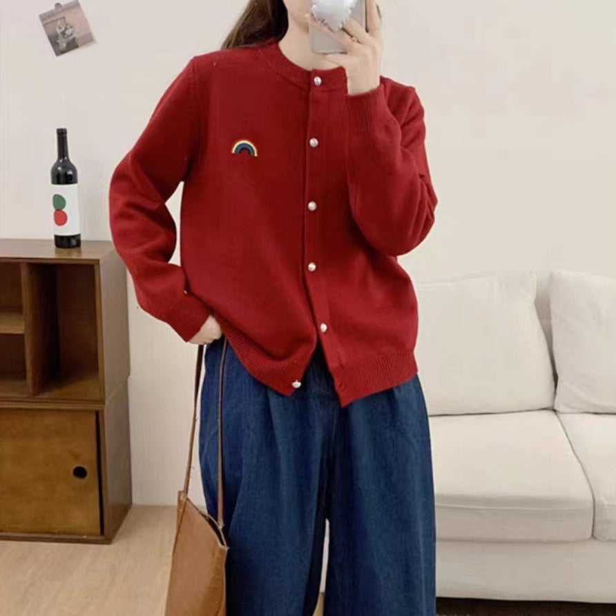 Knitted jacket for women with rainbow pattern and button detail Lune London